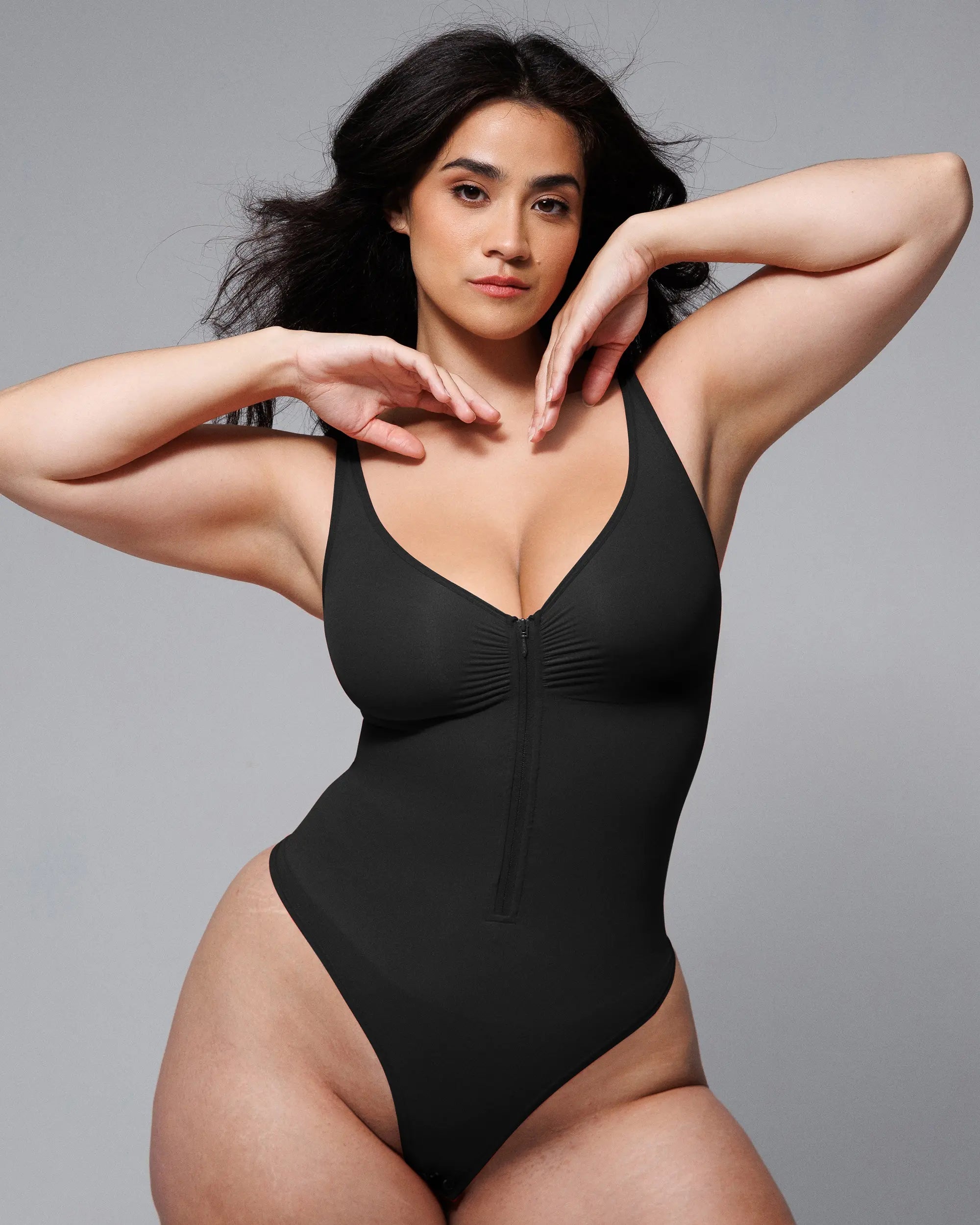 Bare Essentials™ Skin Flow Zipper Front Thong Bodysuit