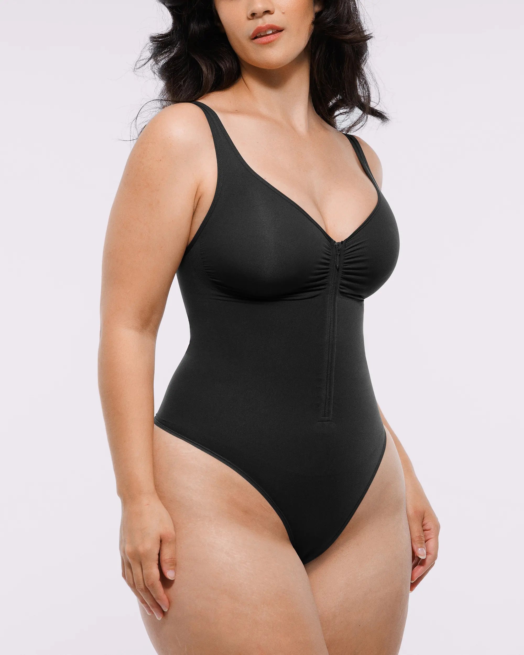 Bare Essentials™ Skin Flow Zipper Front Thong Bodysuit